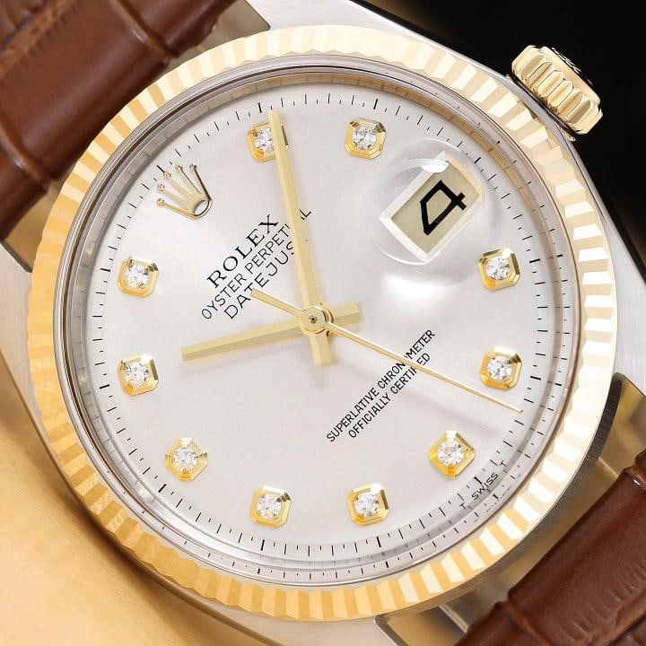 ROLEX DATEJUST 1601 14K GOLD STEEL SILVER DIAMOND WATCH w/ BROWN LEATHER BAND: This is an authentic Rolex Datejust 1601 watch with Rolex dial Ref. with added diamond markers, Rolex 14K yellow gold fluted bezel, and custom genuine brown leather bracelet.. Descriptions: Brand: Rol