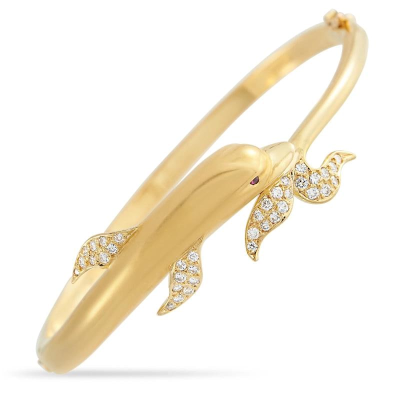 Carrera y Carrera 18K Yellow Gold Diamond Dolphin Bracelet CA02-051926: This bangle style bracelet measures 7 long and includes tab insert clasp closure