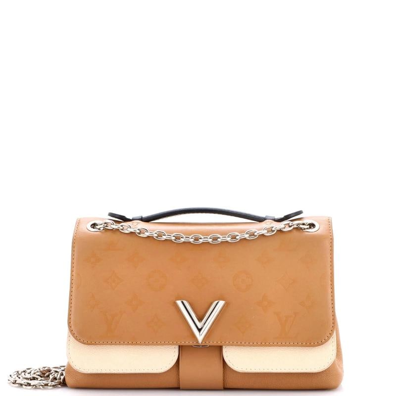 Louis Vuitton Very Chain Bag Monogram Leather: Measurements: Handle Drop 1.5", Height 6.5", Width 10", Depth 3", Strap Drop 12-22"