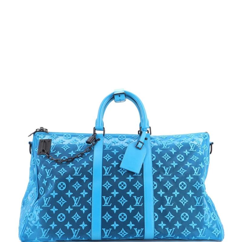 Louis Vuitton Keepall Bandouliere Bag Monogram See Through Mesh 50: Accessories: Lock, Luggage Tag, Poignet Measurements: Handle Drop 4,5", Height 12", Width 20", Depth 9", Strap Drop 13-17"