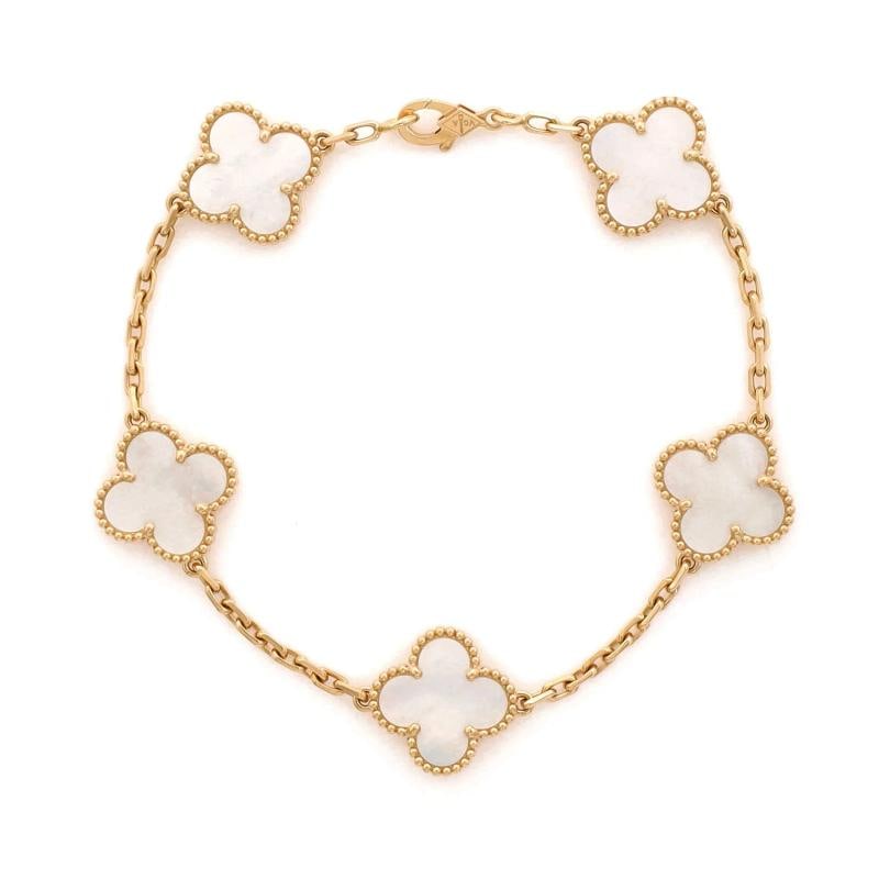 Van Cleef & Arpels Vintage Alhambra 5 Motifs Bracelet 18K Yellow Gold and Mother: Measurements: Circumference: 7.50 ", Width: 14.90 mm