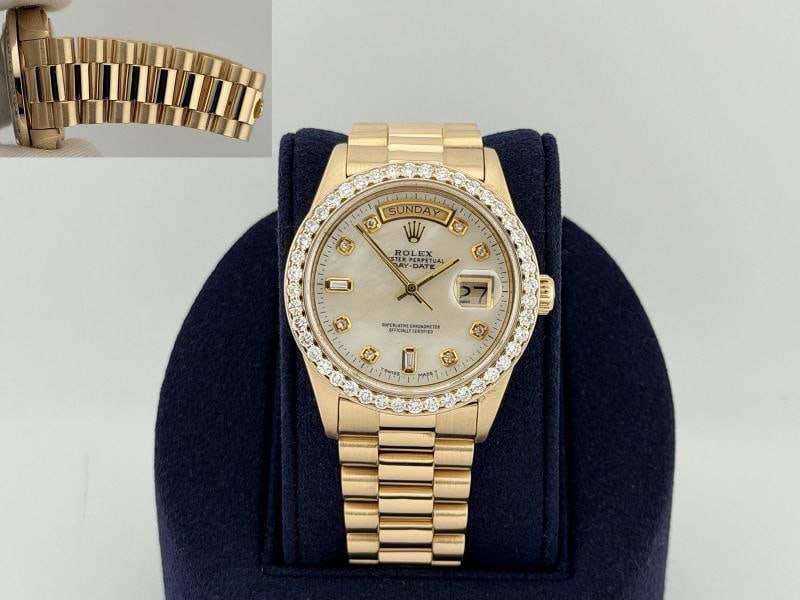 Rolex Day Date President 18038 36mm Mother of Pearl Diamond Dial Bezel 18k Gold: Style Number: 18038 Serial: 621**** Year: 1979 Model: Rolex Day Date President Case Material: 18k Yellow Gold Band: 18k Yellow Gold President Bezel: Custom Diamond Bezel Dial: Custom Mother of Pearl D