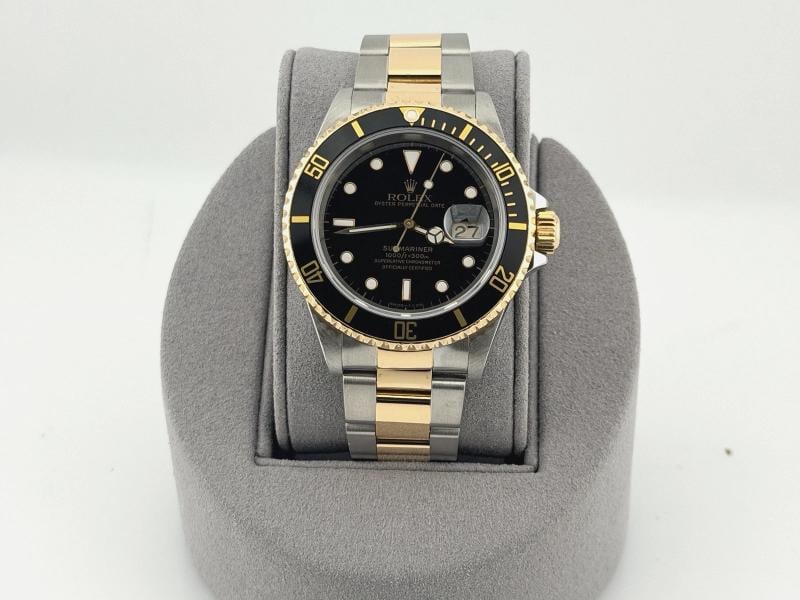 Rolex Submariner 16613 40mm Black Dial 18k Yellow Gold Stainless Steel: Style Number: 16613 Serial: U47**** Year: 1997 Model: Rolex Submariner Case Material: Stainless Steel Band: 18k Yellow Gold & Stainless Steel Bezel: Black Dial: Black Crystal: Sapphire Case Size: 40mm