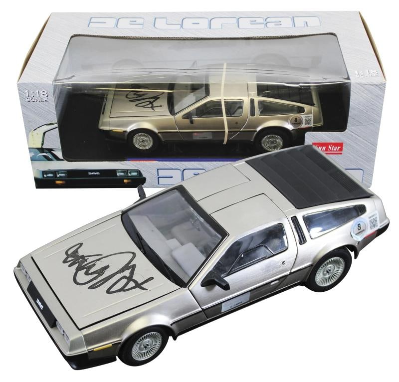 Michael J. Fox Back To The Future Signed 1:18 Die Cast DeLorean BAS: Michael J. Fox Back To The Future Signed 1:18 Die Cast DeLorean BAS