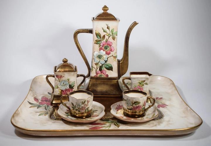 Royal Doulton Aesthetic Movement Tea Set with Tray: Measurements: Pot 10 3/4" high by 7 1/2" wide handle to spout. Cup 2 1/4" high by 3 1/4" wide rim to handle. Creamer 3 3/8" high by 3 1/2" wide spout to handle. Sugar 5" high by 4 1/2" wide handle to 
