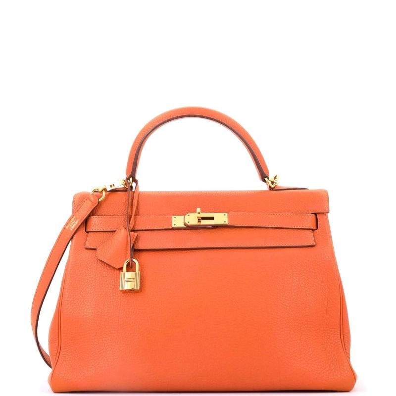 Hermes Kelly Handbag Orange Togo with Gold Hardware 32: Accessories: Clochette, Keys, Lock, With Strap Measurements: Handle Drop 3.5", Height 9", Width 12.5", Depth 4.5", Strap Drop 17"