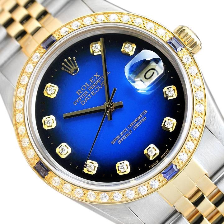 ROLEX MENS DATEJUST 16013 BLUE VIGNETTE SAPPHIRE DIAMOND 18K GOLD STEEL WATCH: This is an authentic Rolex Datejust 16013 watch with two tone 18K yellow gold and stainless steel jubilee bracelet, Rolex dial Ref. with added genuine diamond markers, and custom 18K yellow gold