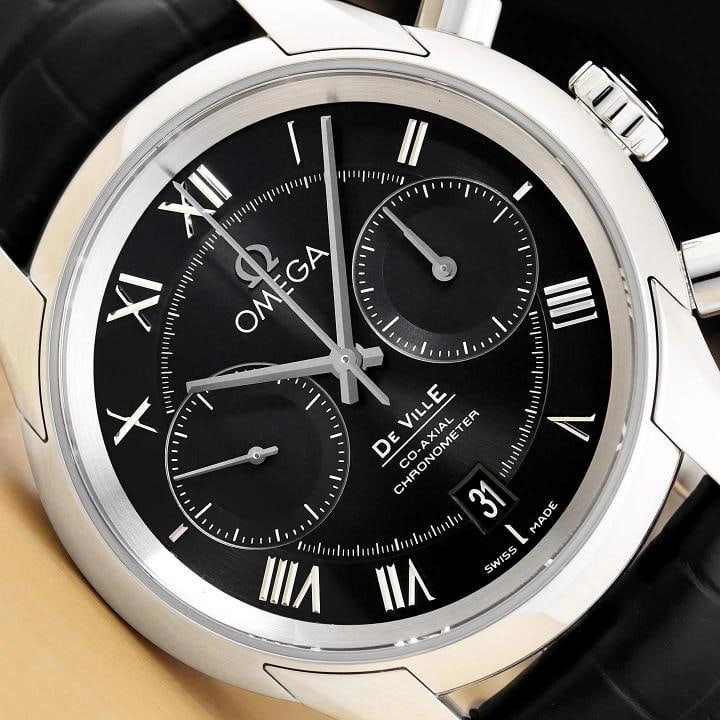 OMEGA B&P DE VILLE HOUR VISION CHRONOGRAPH 431.13.42.51.01.001 BLACK 42MM WATCH: This is an authentic Omega De Ville Hour Vision 431.13.42.51.01.001 42mm black dial watch with black lather bracelet, stainless steel smooth bezel, Omega warranty card, Omega watch box and factory