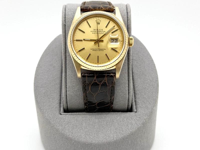 Rolex Datejust 16018 36mm Champagne Dial 18k Yellow Gold Leather Strap: Style Number: 16018 Serial: L68**** Year: 1989 Model: Rolex Datejust Yellow Gold Case Material: 18k Yellow Gold Band: Factory Rolex Leather Crocodile Band Bezel: 18k Yellow Gold Fluted Dial: