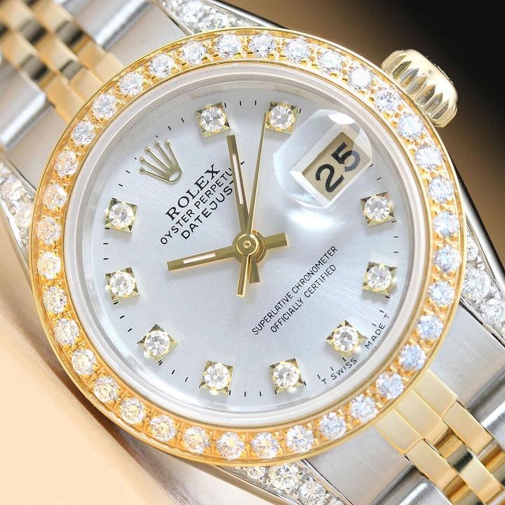 LADIES ROLEX DATEJUST FACTORY DIAMOND DIAL DIAMOND BEZEL LUGS 18K 2-TONE WATCH: Condition: Pre-owned - Excellent,Bezel Color: Gold,Max Wrist Size: 6.26-6.75 in,Number of Jewels: 29 Jewels,Indices: Factory Diamond Dial, 12-Hour Dial,Band: Rolex Two Tone Jubilee Band,Bezel: Custom