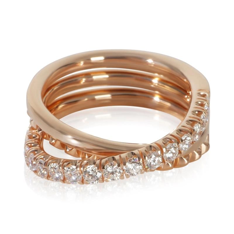 Cartier Rose Gold Diamond Etincelle Ring: Condition: Pre-owned - Good,Shape: Round Brilliant,With Papers: Yes,Side Stone Type: Diamond,Side Stone Weight (cts): 0.63,Metal Purity: 18k,With Original Box/Packaging: No,Gross Weight (grams):