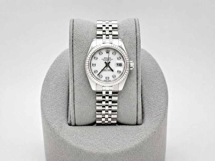 Rolex Ladies Datejust 179174 White Diamond Dial 18k Gold Bezel Steel Jubilee: Style Number: 179174 Serial: D19**** Year: 2005 Model: Rolex Ladies Datejust Case Material: Stainless Steel Band: Stainless Steel Jubilee Bezel: 18k White Gold Fluted Bezel Dial: Factory White