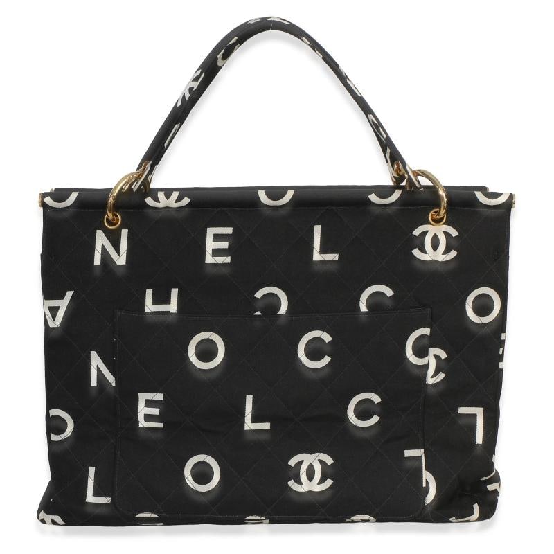 Chanel Vintage Black White Quilted Canvas Logo Tote: Condition: Pre-owned - Good,Dimensions: 15.75 x 12 x 6,Handbag Accessories: Dustbag;Authenticity Card,Bag Width: 15.75 in,Bag Depth: 6 in,Bag Height: 12 in,Department: Unisex,Style: Shoulder Bag;Top