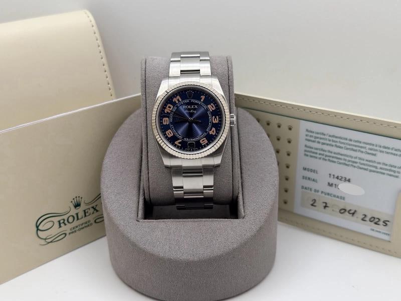 2025 CPO Rolex Air King 114234 34mm Blue Concentric Dial Steel 18k Gold Steel: Style Number: 114234 Serial: M19**** Year: 2008 (2025 CPO) Model: Rolex Air King Case Material: Stainless Steel Band: Stainless Steel Bezel: 18k White Gold Fluted Dial: Blue Arabic Concentric Dial Cry