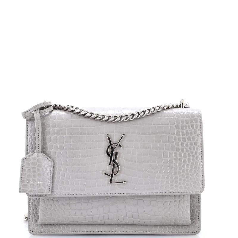Saint Laurent Sunset Crossbody Bag Crocodile Embossed Leather Medium: Accessories: Clochette Measurements: Handle Drop 11.5", Height 6", Width 8.5", Depth 3", Strap Drop 12-20.5" . Condition: Pre-owned - Excellent,Brand: Saint Laurent,Exterior Material: Leather,Style: