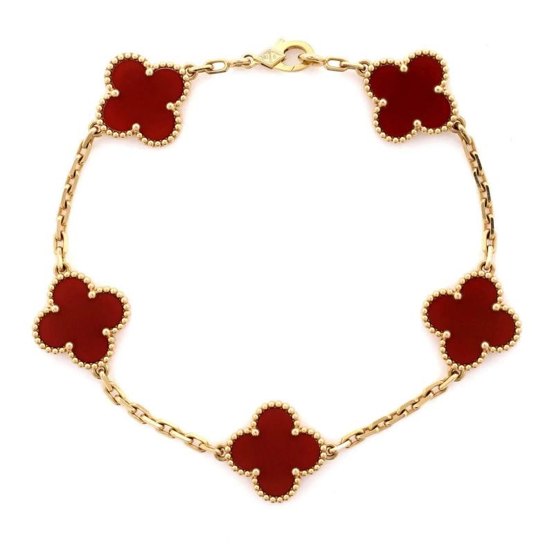Van Cleef & Arpels Vintage Alhambra 5 Motifs Bracelet 18K Yellow Gold: Measurements: Circumference: 6.75 ", Width: 14.80 mm Condition: Pre-owned - Good,Brand: Van Cleef & Arpels,Main Stone: Carnelian,Metal: 18K Yellow Gold,Metal Purity: 18K,Style: Bracelet,Type: