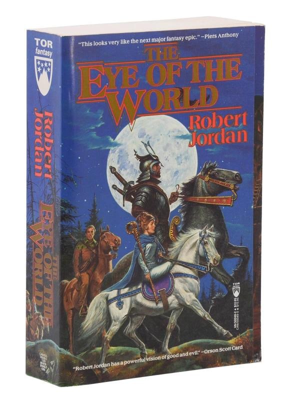 The Eye of the World ~ by ROBERT JORDAN ~ First Edition ~ 1st Printing 1990: First edition, first printing, paperback issue New York: Tor Fantasy, 1990. First edition, first printing, wrappered issue. xiv, [iv], 670 pp. Bound in publisher's wraps. Near Fine with a little