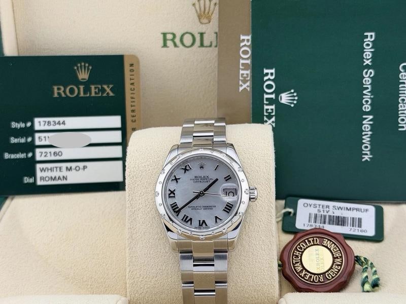 Rolex Datejust Midsize 178344 31mm Mother of Pearl Dial Diamond Bezel Steel: Style Number: 178344 Year: 2014 Model: Rolex Datejust 31 Case Material: Stainless Steel Band: Stainless Steel Bezel: Factory Scattered Diamond Bezel Dial: Factory Mother of Pearl Roman Numeral Dial