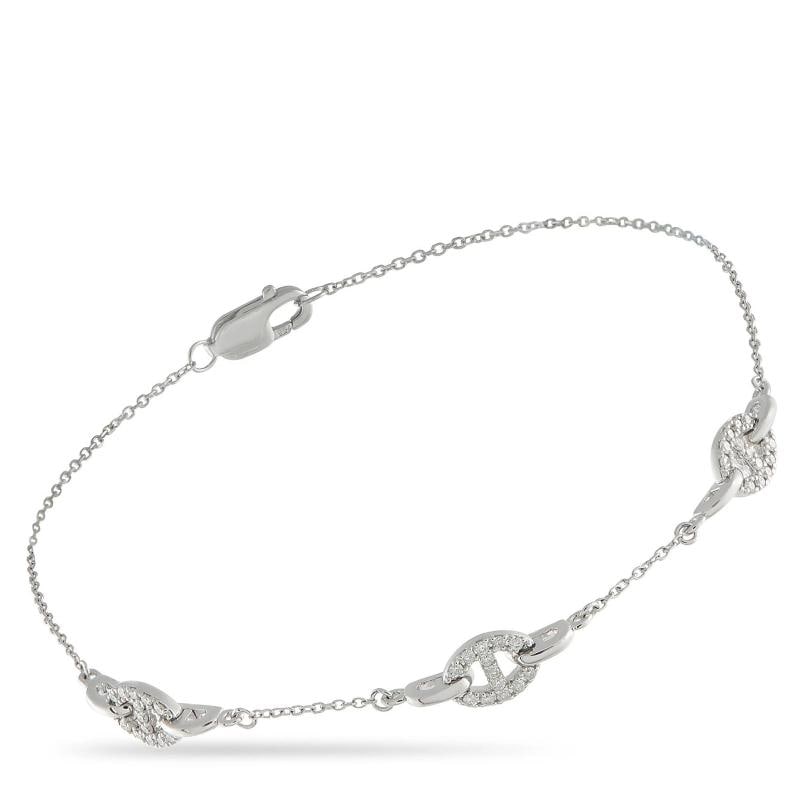 18K White Gold 0.20ct Diamond Bracelet: It measures 7.25 long. Condition: New with packaging: This item is brand new and has never been worn. It still has the original ... Read moreabout the conditionNew with packaging: This item is brand