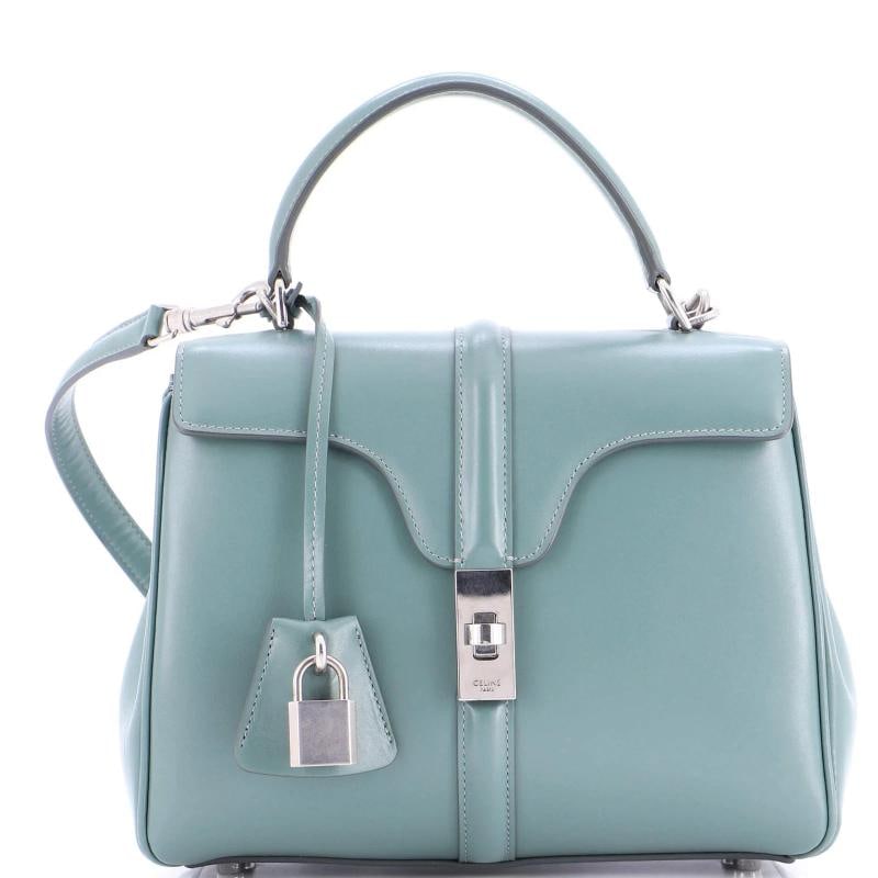 Celine 16 Top Handle Bag Smooth Calfskin Small: Estimated Retail Price: $4,350 Condition: Very good. Exterior: minor corner wear, minor edge wear, minor scuffs | Handles/Straps: minor creases, minor scuffs, minor discoloration | Interior: scuffs,