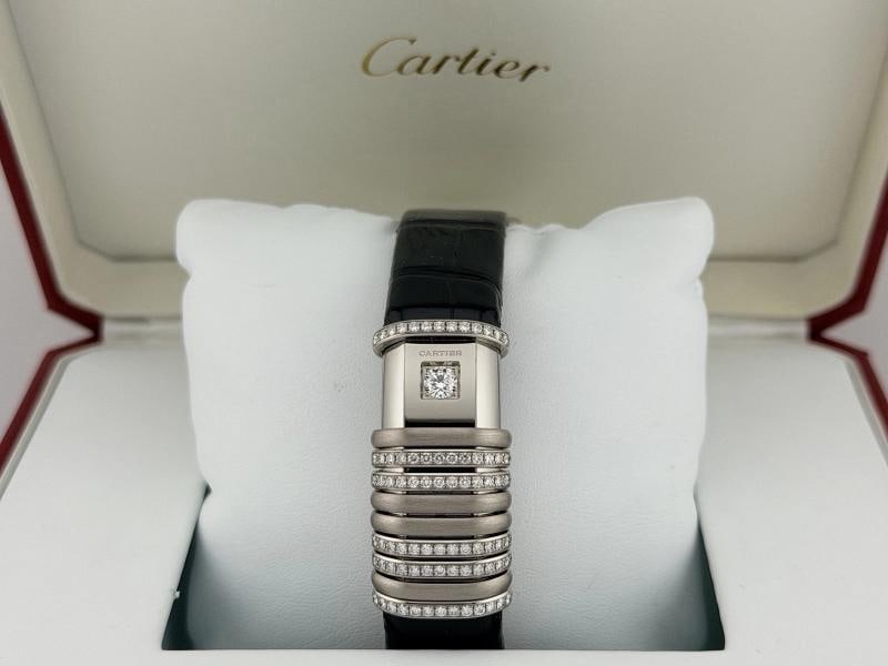 Cartier Declaration 2611 WT000450 18k White Gold 6 Diamond Bars Titanium: Style Number: 2611 / WT000450 Year: Circa 2000's Model: Cartier Declaration Case Material: Titanium Band: Brand New Black Alligator Bezel: 18k White Gold Sliding Bars (6 Bars with Diamonds) Dial: