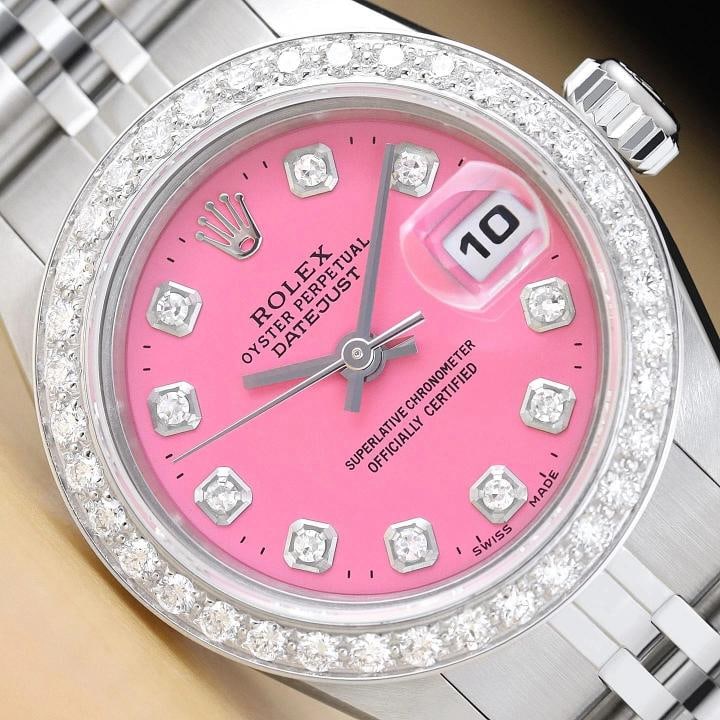 ROLEX LADIES DATEJUST 69174 PINK DIAL 18K WHITE GOLD STEEL DIAMOND JUBILEE WATCH: This is an authentic Rolex Datejust 69174 watch with custom stainless steel jubilee bracelet, Rolex dial Ref. with added diamond markers, and custom 18K white gold diamond bezel. Descriptions: Brand:
