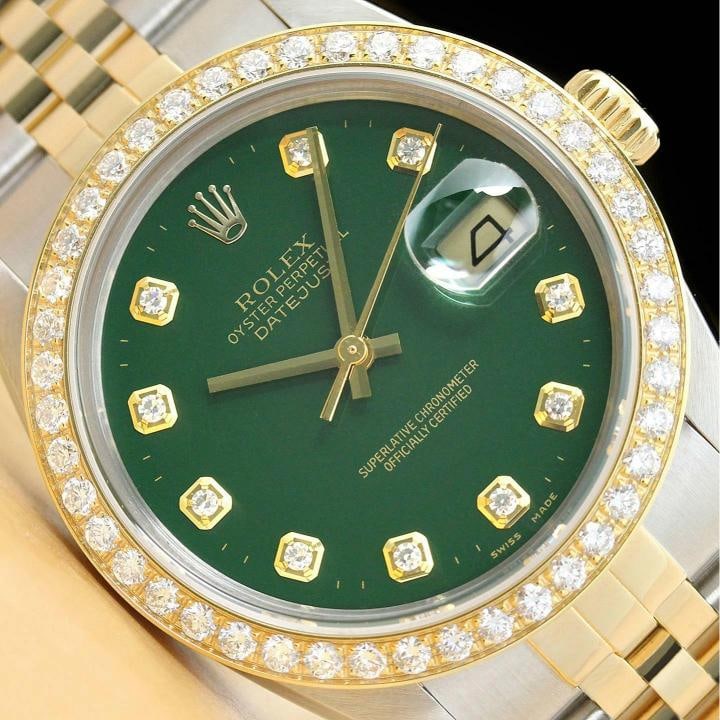 ROLEX MENS DATEJUST 16013 GREEN 1.6 CT BEZEL DIAMOND 18K GOLD STEEL WATCH: This is an authentic Rolex Datejust 16013 watch with Rolex 18K yellow gold and stainless steel jubilee bracelet, Rolex dial Ref. with added diamond markers, and custom 18K yellow gold 1.6 CT diamond b
