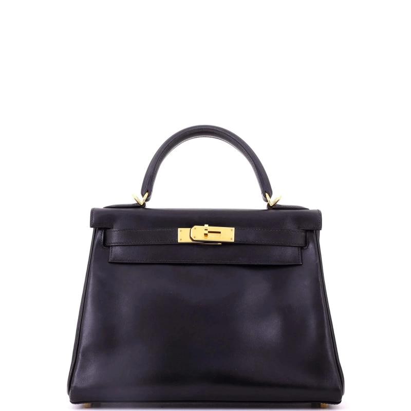 Hermes Kelly Handbag Black Box Calf with Gold Hardware 28: Condition: Good. Exterior: scuffs, minor creases, minor edge wear | Handles/Straps: discoloration, minor scuffs | Interior: scuffs, light odor, minor discoloration | Hardware: scratches, minor