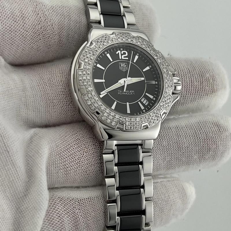 TAG Heuer Formula 1 Ladies WAC1214.BA0852 35mm Diamond Bezel Stainless Steel: Country of Origin Switzerland Year Manufactured 2010-2019 Band/Strap Bracelet Case Color Silver Department Women Bezel Type Diamond Watch Shape Round Style Classic, Dress/Formal, Formal, Luxury,