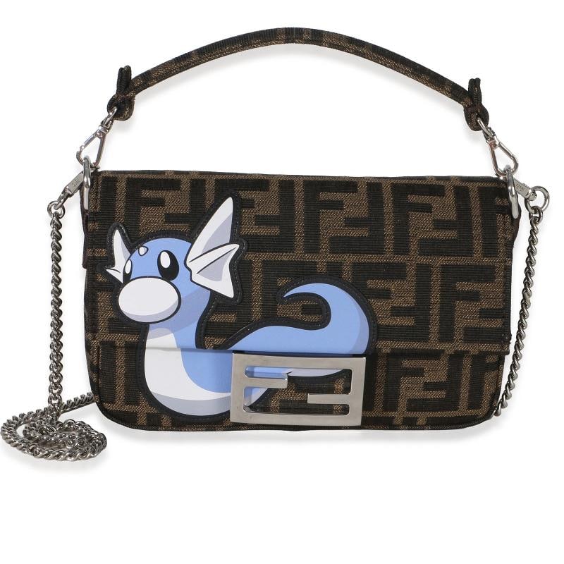 Fendi X FRGMT X POKEMON Brown FF Jacquard Fabric Dratini Mini Baguette Bag: Condition Pre-owned - Good Seller Notes Ã¢â‚¬Å“Founded in Rome in 1925 Fendi's early days were centred around leather and fur creations. Today the ... Read