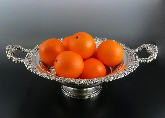 Fine Old Sheffield Fused Silverplate Double Handle Pedestal Bowl Centerpiece: Presented is a fine old English Sheffield fused plate pedestal bowl or double handle compote. This piece dates to circa 1810-1820. The dish is very well made, with richly detailed hand chased and