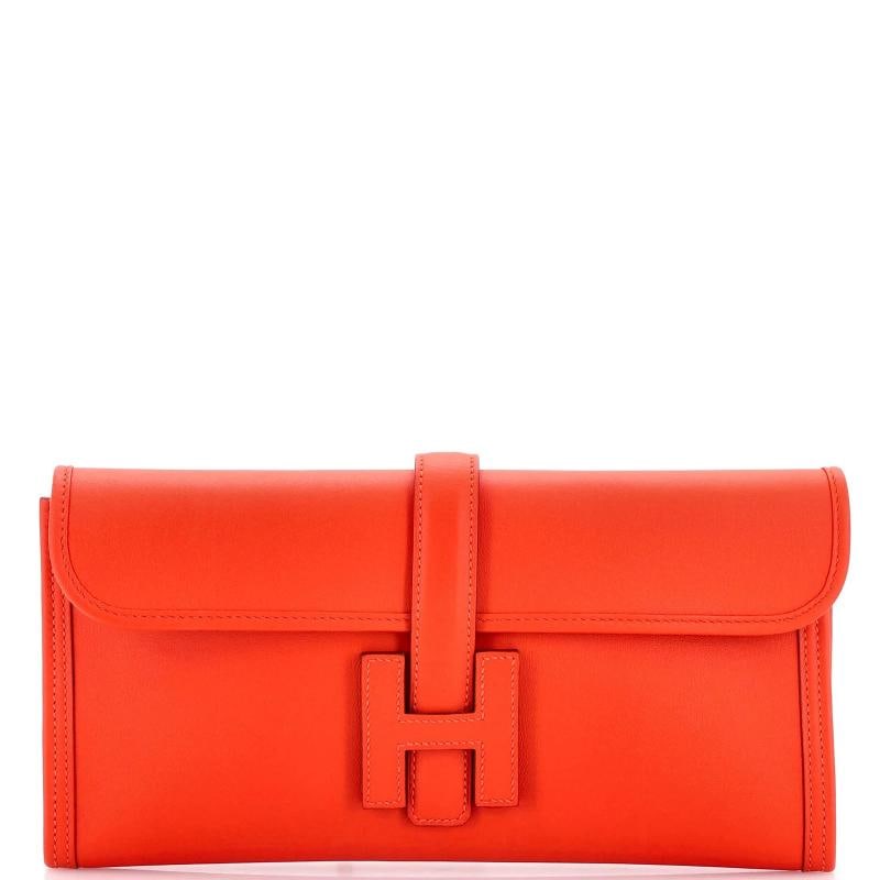 Hermes Jige Elan Clutch Swift 29: Condition: Excellent. Exterior: minor scuffs | Interior: minor scuffs Accessories: No Accessories Measurements: Height 6", Width 11.5", Depth 1" Designer: Hermes Model: Jige Elan Clutch Swift 29