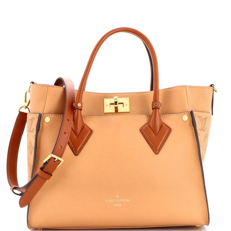 Louis Vuitton On My Side Tote Mahina Leather MM: Accessories: Dust Bag, With Strap Measurements: Handle Drop 4.5", Height 10", Width 12", Depth 5.5", Strap Drop 17.5-18.5". Condition: Pre-owned - Good,Brand: Louis Vuitton,Exterior Material:
