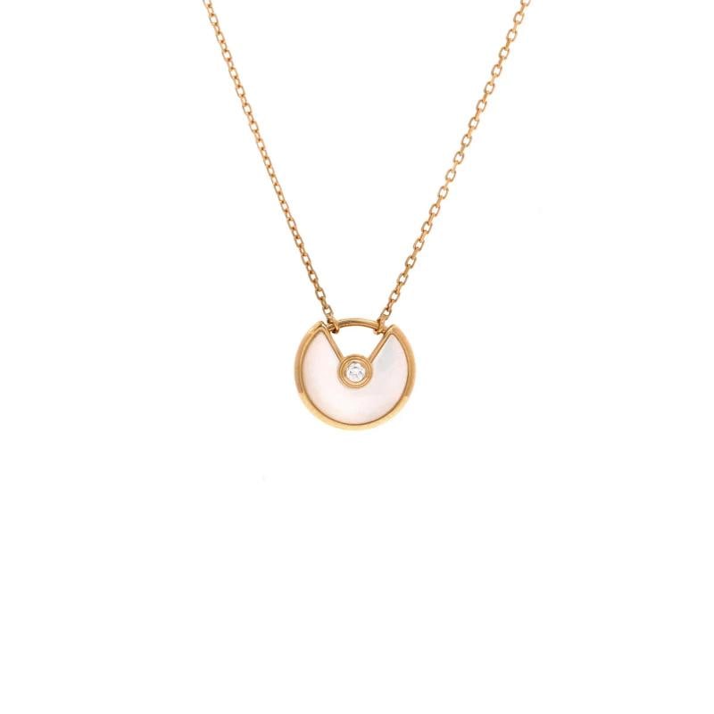 Cartier Amulette de Cartier Pendant Necklace 18K Yellow Gold with Mother of: Measurements: Length: 15.0 - 16.25 ", Pendant Length: 11.20 mm, Pendant Width: 12.00 mm . Condition: Pre-owned - Good,Brand: Cartier,Main Stone: Mother Of Pearl,Metal: 18K Yellow Gold,Metal Purity: