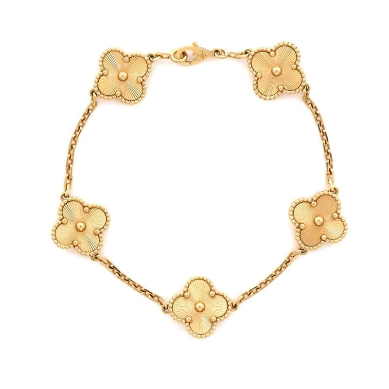 Van Cleef & Arpels Vintage Alhambra 5 Motifs Bracelet Guilloche 18K Yellow Gold: Measurements: Circumference: 8 ", Width: 14.90 mm . Condition: Pre-owned - Good,Brand: Van Cleef & Arpels,Main Stone: Unknown,Metal: 18K Yellow Gold,Metal Purity: 18K,Style: Bracelet,Type: