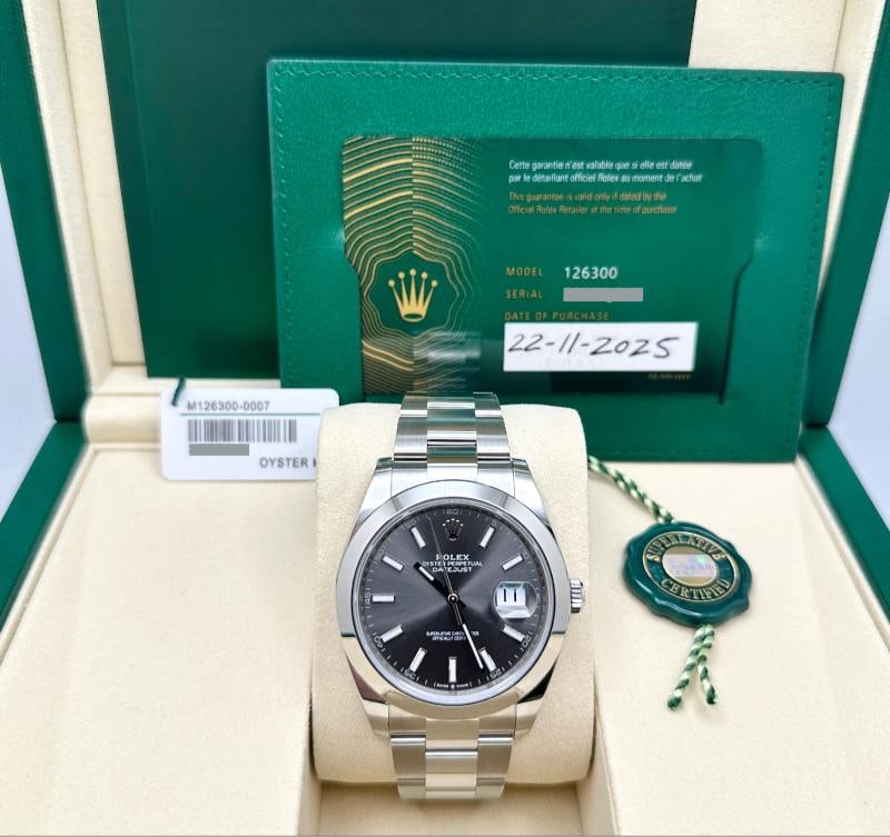 Brand New 2025 Rolex Datejust 41 126300 Slate Rhodium Dial Steel Box Paper: Style Number: 126300 Year: 2025 Brand New Model: Rolex Datejust 41 Case Material: Stainless Steel Band: Stainless Steel Bezel: Stainless Steel Dial: Gray Rhodium Dial Face: Sapphire Case Size: 41mm