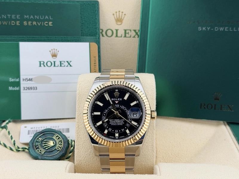 Rolex Sky Dweller 326933 42mm Black Dial 18k Yellow Gold Steel Box Paper: Style Number: 326933 Year: 2017 Model: Rolex Sky Dweller Case Material: Stainless Steel Band: 18k Yellow Gold & Stainless Steel Bezel: 18k Yellow Gold Fluted Dial: Black Crystal: Sapphire Case Size: 4
