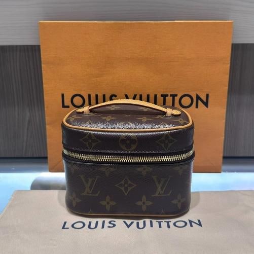 Louis Vuitton Nice Nano Monogram Vanity Pouch Brown Hand Bag: Condition: Pre-owned - Excellent,Bag Width: 5.5 in,Shape: Rectangle,Closure: Zip,Handle/Strap Color: Beige,Size: Nano,Hardware Color: Gold,Bag Depth: 3.3 in,Accents: Zipper,Vintage: No,Personalize: