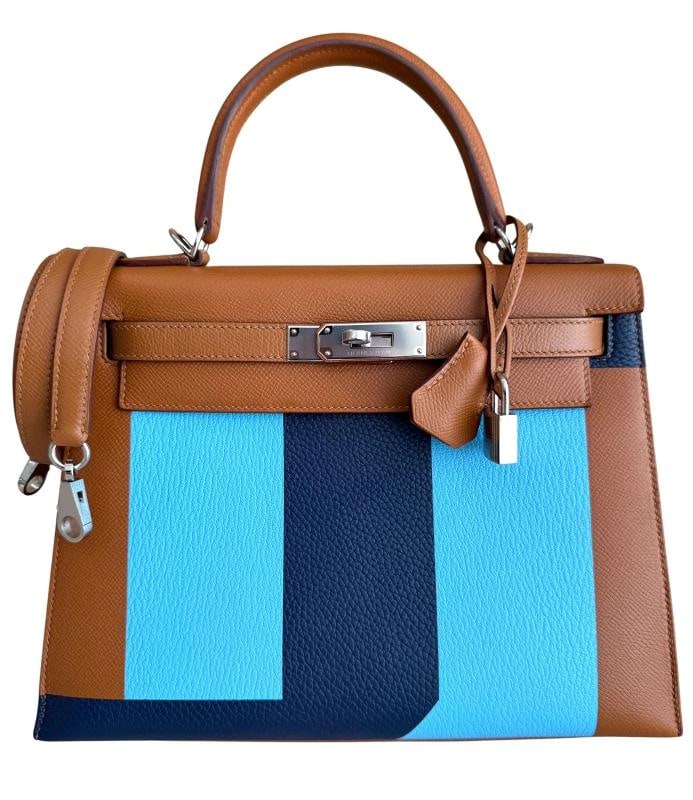 Hermes Kelly 28 Sellier Limited Kellygraphie Phw , Blue Celeste, Indigo Epsom: 8"H x 11.5"W x 4"D. Condition: Pre-owned - Excellent,Bag Width: 11.5 in,Closure: Turn Lock,Handle/Strap Color: Gold,Size: Small,Hardware Color: Silver,Bag Depth: 4 in,Vintage: No,Personalize: No,Acces
