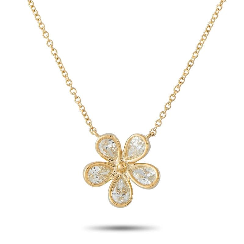 18K Yellow Gold 1.0ct Diamond Flower Necklace: Set in 18K Yellow Gold, the pendant is suspended at the center of this pieces delicate 17.5 chain. Condition: Pre-owned - Good: This item has been gently used but is in good condition. It might have