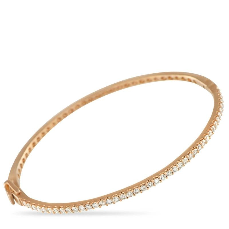14K Rose Gold 1.10ct Diamond Bangle Bracelet: Condition: New with packaging: This item is brand new and has never been worn. It still has the original ... Read moreabout the conditionNew with packaging: This item is brand new and has never been