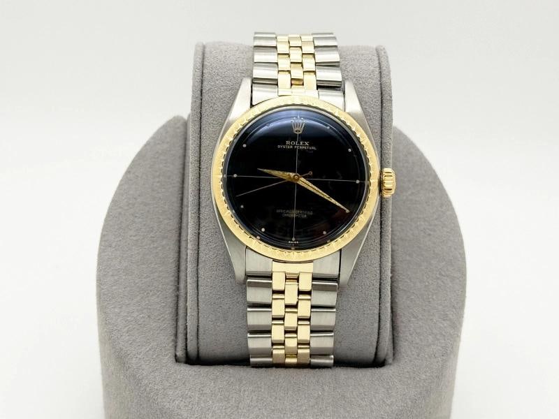 Vintage Rolex Oyster Perpetual Zephyr 6582 34mm Black Dial 14k Yellow Gold Steel: Style Number: 6582 Serial Number: 329*** Year: 1958 Model: Rolex Oyster Perpetual Zephyr Case Material: Stainless Steel Band: 14k Yellow Gold & Stainless Steel Jubilee Bezel: 14K Yellow Gold Dial: Bla