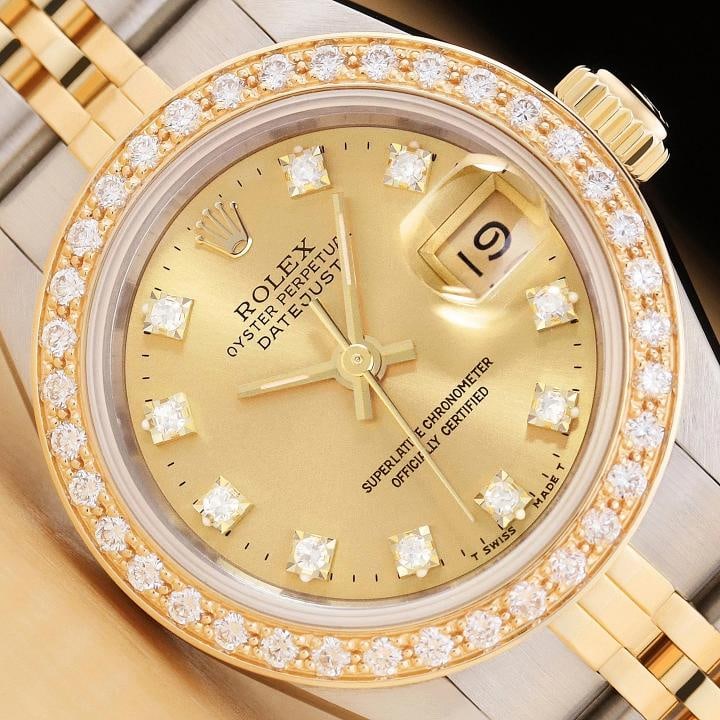 LADIES ROLEX DATEJUST 69173 FACTORY DIAMOND CHAMPAGNE DIAL 18K GOLD SS WATCH: This is an authentic Rolex Datejust 69173 watch with Rolex 18K yellow gold and stainless steel jubilee band, factory Rolex diamond dial Ref., and custom 18K yellow gold diamond bezel..Descriptions: