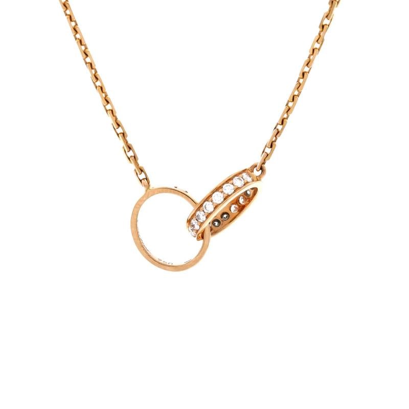 Cartier Love Interlocking Necklace 18K Rose Gold with Diamonds: Condition: Pre-owned - Good,Brand: Cartier,Main Stone: Diamond,Metal: 18K Rose Gold,Metal Purity: 18K,Style: Necklace,Type: Necklace,Color: Rose Gold,Material: 18K Rose Gold, Diamond