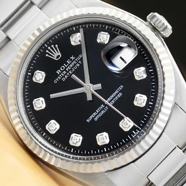 MENS ROLEX DATEJUST BLACK DIAMOND DIAL 18K WHITE GOLD FLUTED BEZEL STEEL WATCH: Condition: Pre-owned - Excellent,Bezel Color: Silver,Max Wrist Size: 7.26-7.5 in,Number of Jewels: 26 Jewels,Indices: Diamond Hour Marks, 12-Hour Dial, Multiple Hands,Stone: Diamond,Bezel: Rolex 18K