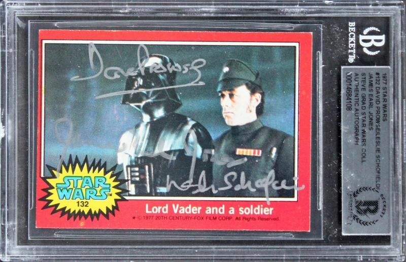 Star Wars (3) Prowse, Schofield & Jones Signed 1977 Star Wars #132 Card BAS Slab: Industry: Movies,Original/Reproduction: Original,Autograph Authentication: Beckett,PRODUCT_COA: Beckett,PRODUCT_SIGNED_BY_NAME: David Prowse, Leslie Schofield & James Earl