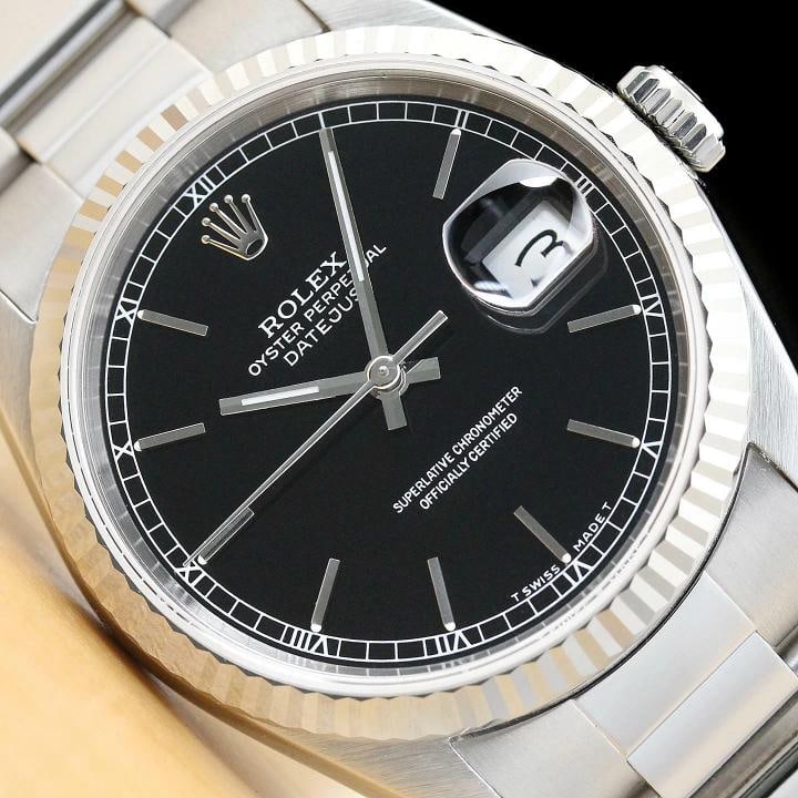 ROLEX MENS DATEJUST 16234 BLACK DIAL 18K WHITE GOLD STAINLESS STEEL WATCH: Condition: Pre-owned - Excellent,Bezel Color: Silver,Max Wrist Size: 7.26-7.5 in,Number of Jewels: 31 Jewels,Indices: Stick Indexes, 12-Hour Dial,Bezel: Rolex 18K White Gold Fluted Bezel,Band/Strap: