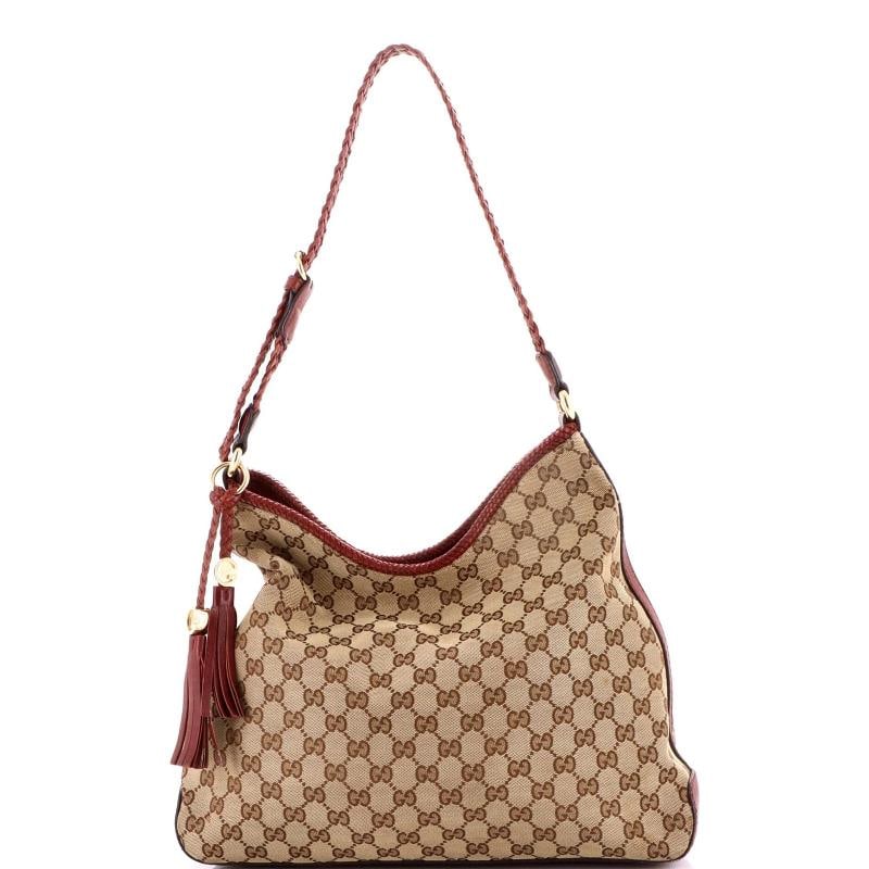 Gucci Marrakech Hobo GG Canvas Medium: Condition: Pre-owned - Good,Brand: Gucci,Exterior Material: Canvas Coated,Style: Hobos,Exterior Color: Brown,Department: Women,Size: Medium Condition: Good. Exterior: heavy scuffs on base, heavy edge