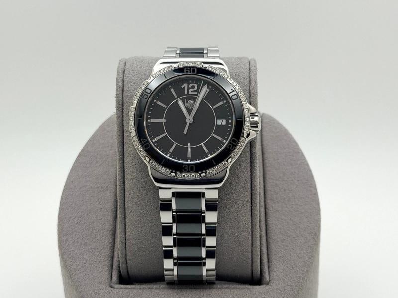 TAG Heuer Formula 1 WAH1212 37mm Black Dial Diamond Bezel Stainless Quartz: Condition: Pre-owned - Excellent,Case Size: 37 mm,Movement: Quartz,Seller Warranty: Yes,Indices: Baton Indexes,Year Manufactured: 2010-2019,Band/Strap: Bracelet,Reference Number: WAH1212,Brand: TAG