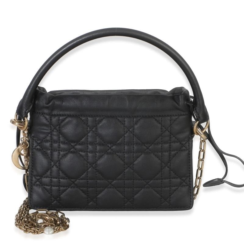 Christian Dior Black Lambskin Cannage Lady Dior Milly Mini Drawstring Bag: Condition: Pre-owned - Good,Dimensions: 7.5 x 5.4 x 2,Handbag Accessories: None,Bag Width: 7.5 in,Bag Depth: 2 in,Bag Height: 5.4 in,Department: Unisex,Style: Crossbody Bag;Shoulder Bag;Top